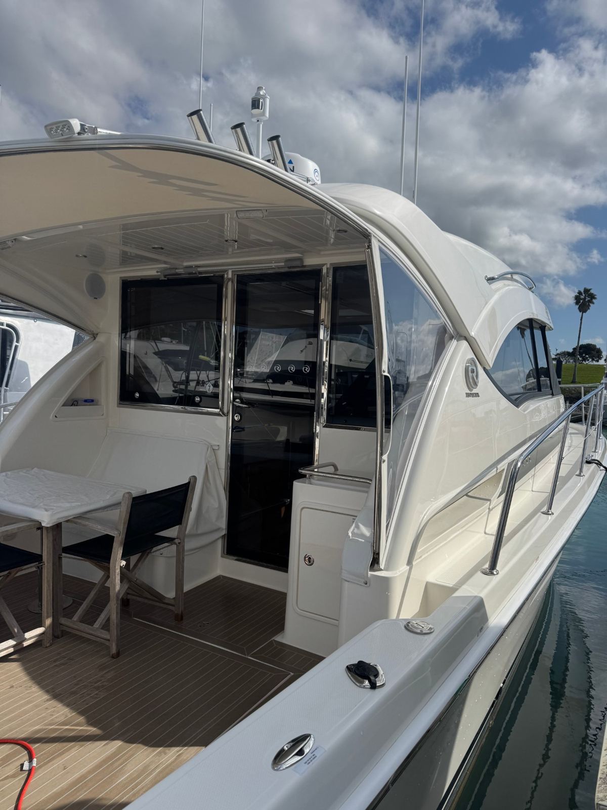 Clean cockpit with teak floor and polished stainless
