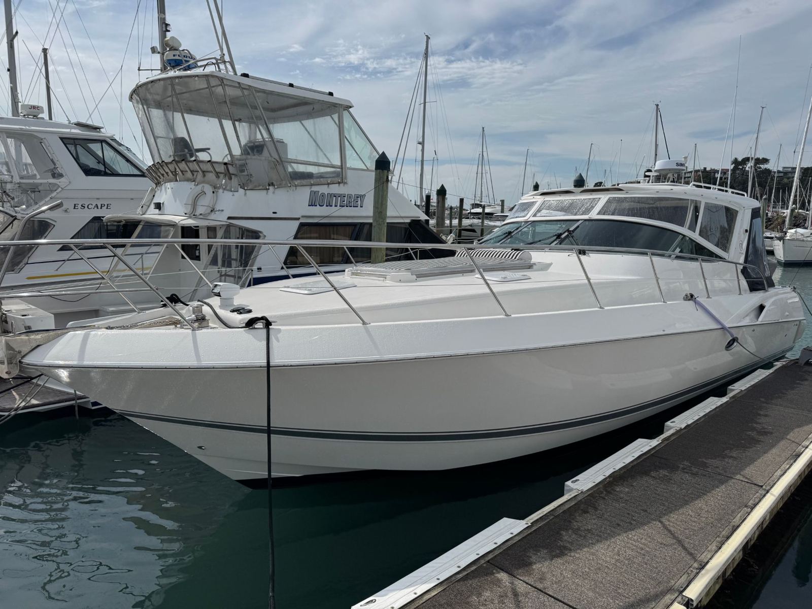 Sport cruiser kept clean at its marina berth